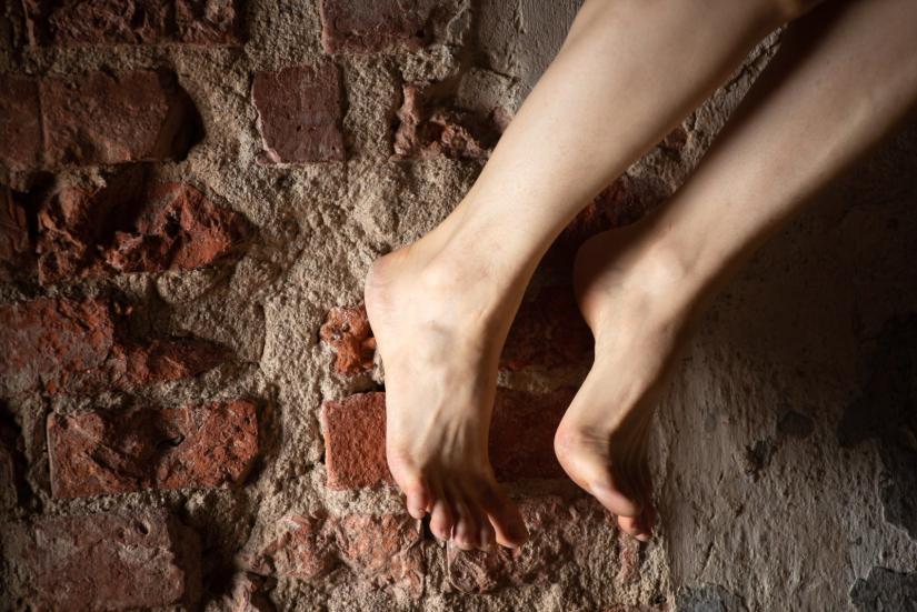 Bare feet on a rock