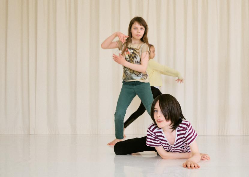 Photo: Ilkka Saastamoinen Markting pohoto featuring three children dancing.